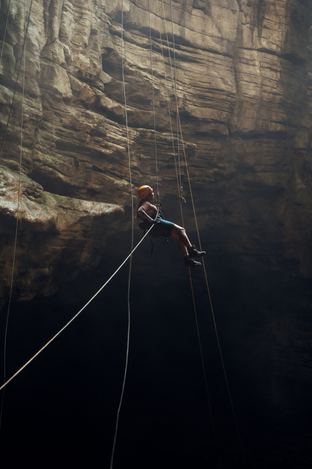 Roping down into a cave cenote